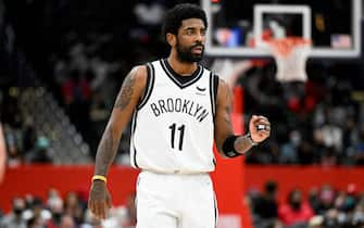 WASHINGTON, DC - FEBRUARY 10: Kyrie Irving #11 of the Brooklyn Nets gestures during the second quarter against the Washington Wizards at Capital One Arena on February 10, 2022 in Washington, DC. NOTE TO USER: User expressly acknowledges and agrees that, by downloading and or using this photograph, User is consenting to the terms and conditions of the Getty Images License Agreement.  (Photo by Greg Fiume/Getty Images)