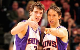 PHOENIX - DECEMBER 15:  Goran Dragic #2 and Steve Nash #13 of the Phoenix Suns discuss a play during the game against the San Antonio Spurs on December 15, 2009 at US Airways Center in Phoenix, Arizona.  The Suns won 116-104.  NOTE TO USER: User expressly acknowledges and agrees that, by downloading and/or using this Photograph, user is consenting to the terms and conditions of the Getty Images License Agreement. Mandatory Copyright Notice: Copyright 2009 NBAE   (Photo by Barry Gossage/NBAE via Getty Images)