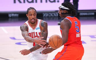 CHICAGO, IL - FEBRUARY 12: Chicago Bulls forward DeMar DeRozan (11) passes the ball in action during a NBA game between the Oklahoma City Thunder and the Chicago Bulls on February 12, 2022 at the United Center in Chicago, IL. (Photo by Melissa Tamez/Icon Sportswire via Getty Images)