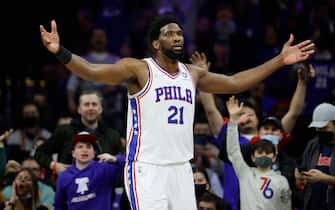 PHILADELPHIA, PENNSYLVANIA - FEBRUARY 12: Joel Embiid #21 of the Philadelphia 76ers reacts during the fourth quarter against the Cleveland Cavaliers at Wells Fargo Center on February 12, 2022 in Philadelphia, Pennsylvania. NOTE TO USER: User expressly acknowledges and agrees that, by downloading and or using this photograph, User is consenting to the terms and conditions of the Getty Images License Agreement. (Photo by Tim Nwachukwu/Getty Images)