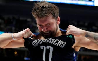 DALLAS, TEXAS - FEBRUARY 12: Luka Doncic #77 of the Dallas Mavericks rips his jersey as he walks off the court after the loss to the Los Angeles Clippers at American Airlines Center on February 12, 2022 in Dallas, Texas. NOTE TO USER: User expressly acknowledges and agrees that, by downloading and or using this photograph, User is consenting to the terms and conditions of the Getty Images License Agreement. (Photo by Richard Rodriguez/Getty Images)