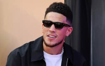 INGLEWOOD, CALIFORNIA - FEBRUARY 13: NBA player Devin Booker attends Super Bowl LVI between the Los Angeles Rams and the Cincinnati Bengals at SoFi Stadium on February 13, 2022 in Inglewood, California. (Photo by Kevin C. Cox/Getty Images)