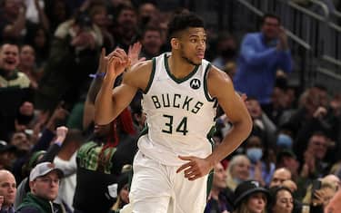 MILWAUKEE, WISCONSIN - FEBRUARY 15: Giannis Antetokounmpo #34 of the Milwaukee Bucks reacts to a three point shot during the second half of a game against the Indiana Pacers at Fiserv Forum on February 15, 2022 in Milwaukee, Wisconsin. NOTE TO USER: User expressly acknowledges and agrees that, by downloading and or using this photograph, User is consenting to the terms and conditions of the Getty Images License Agreement. (Photo by Stacy Revere/Getty Images)