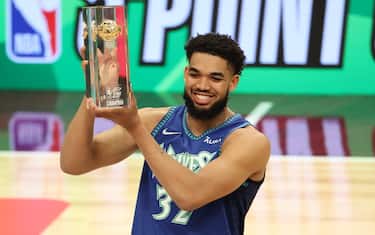 CLEVELAND, OH - FEBRUARY 19: Karl-Anthony Towns #32 of the Minnesota Timberwolves holds his trophy after winning the MTN DEW 3-Point Contest during State Farm All-Star Saturday Night on February 19, 2022 at Rocket Mortgage FieldHouse in Cleveland, Ohio. NOTE TO USER: User expressly acknowledges and agrees that, by downloading and or using this photograph, User is consenting to the terms and conditions of the Getty Images License Agreement. Mandatory Copyright Notice: Copyright 2022 NBAE (Photo by Joe Murphy/NBAE via Getty Images)