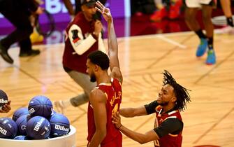 CLEVELAND, OHIO - FEBRUARY 19: Evan Mobley #4 and Darius Garland #10 of Team Cavs react during the Taco Bell Skills Challenge as part of the 2022 All-Star Weekend at Rocket Mortgage Fieldhouse on February 19, 2022 in Cleveland, Ohio. NOTE TO USER: User expressly acknowledges and agrees that, by downloading and or using this photograph, User is consenting to the terms and conditions of the Getty Images License Agreement. (Photo by Jason Miller/Getty Images)