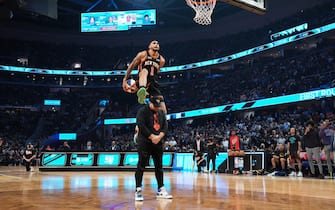CLEVELAND, OH - FEBRUARY 19: Obi Toppin #1 of the New York Knicks dunks the ball during the AT&T Slam Dunk Contest as part of 2022 NBA All Star Weekend on February 19, 2022 at Rocket Mortgage FieldHouse in Cleveland, Ohio. NOTE TO USER: User expressly acknowledges and agrees that, by downloading and/or using this Photograph, user is consenting to the terms and conditions of the Getty Images License Agreement. Mandatory Copyright Notice: Copyright 2022 NBAE (Photo by Jesse D. Garrabrant/NBAE via Getty Images)