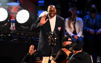 CLEVELAND, OHIO - FEBRUARY 20: Earvin "Magic" Johnson reacts after being introduced as part of the NBA 75th Anniversary Team during the 2022 NBA All-Star Game at Rocket Mortgage Fieldhouse on February 20, 2022 in Cleveland, Ohio. NOTE TO USER: User expressly acknowledges and agrees that, by downloading and or using this photograph, User is consenting to the terms and conditions of the Getty Images License Agreement. (Photo by Jason Miller/Getty Images)