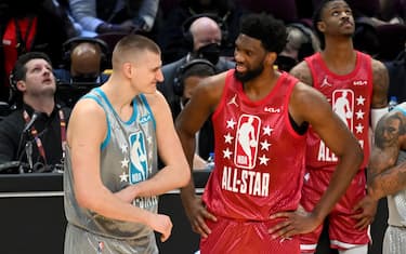 CLEVELAND, OHIO - FEBRUARY 20: Nikola Jokic #15 of Team LeBron and Joel Embiid #21 of Team Durant talk during the 2022 NBA All-Star Game at Rocket Mortgage Fieldhouse on February 20, 2022 in Cleveland, Ohio. NOTE TO USER: User expressly acknowledges and agrees that, by downloading and or using this photograph, User is consenting to the terms and conditions of the Getty Images License Agreement. (Photo by Jason Miller/Getty Images)