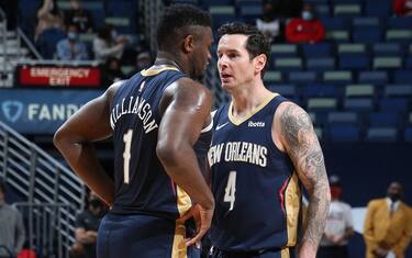 NEW ORLEANS, LA - FEBRUARY 17: Zion Williamson #1 and JJ Redick #4 of the New Orleans Pelicans talk during the game against the Portland Trail Blazers on February 17, 2021 at the Smoothie King Center in New Orleans, Louisiana. NOTE TO USER: User expressly acknowledges and agrees that, by downloading and or using this Photograph, user is consenting to the terms and conditions of the Getty Images License Agreement. Mandatory Copyright Notice: Copyright 2021 NBAE (Photo by Layne Murdoch Jr./NBAE via Getty Images)