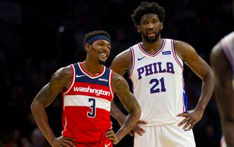 PHILADELPHIA, PA - OCTOBER 18: Bradley Beal #3 of the Washington Wizards talks to Joel Embiid #21 of the Philadelphia 76ers during the preseason game at the Wells Fargo Center on October 18, 2019 in Philadelphia, Pennsylvania. NOTE TO USER: User expressly acknowledges and agrees that, by downloading and or using this photograph, User is consenting to the terms and conditions of the Getty Images License Agreement.(Photo by Mitchell Leff/Getty Images)