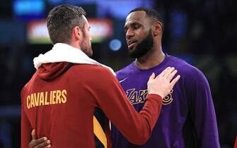 LOS ANGELES, CALIFORNIA - JANUARY 13:  Kevin Love #0 of the Cleveland Cavaliers hugs LeBron James #23 of the Los Angeles Lakers after a game at Staples Center on January 13, 2020 in Los Angeles, California. NOTE TO USER: User expressly acknowledges and agrees that, by downloading and/or using this photograph, user is consenting to the terms and conditions of the Getty Images License Agreement. (Photo by Sean M. Haffey/Getty Images)