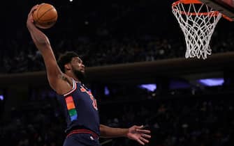 NEW YORK, NEW YORK - FEBRUARY 27: Joel Embiid #21 of the Philadelphia 76ers dunks the ball against the New York Knicks during the first half at Madison Square Garden on February 27, 2022 in New York City. NOTE TO USER: User expressly acknowledges and agrees that, by downloading and or using this Photograph, user is consenting to the terms and conditions of the Getty Images License Agreement. (Photo by Adam Hunger/Getty Images)
