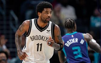 CHARLOTTE, NORTH CAROLINA - MARCH 08: Kyrie Irving #11 of the Brooklyn Nets plays against the Charlotte Hornets in the fourth quarter during their game at Spectrum Center on March 08, 2022 in Charlotte, North Carolina. NOTE TO USER: User expressly acknowledges and agrees that, by downloading and or using this photograph, User is consenting to the terms and conditions of the Getty Images License Agreement. (Photo by Jacob Kupferman/Getty Images)