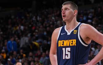 DENVER, CO - MARCH 10: Nikola Jokic #15 of the Denver Nuggets looks on during the game against the Golden State Warriors on March 10, 2022 at the Ball Arena in Denver, Colorado. NOTE TO USER: User expressly acknowledges and agrees that, by downloading and/or using this Photograph, user is consenting to the terms and conditions of the Getty Images License Agreement. Mandatory Copyright Notice: Copyright 2022 NBAE (Photo by Bart Young/NBAE via Getty Images)