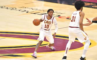 CLEVELAND, OHIO - MARCH 22: Darius Garland #10 drives to the basket around Jarrett Allen #31 of the Cleveland Cavaliers during the second quarter against the Sacramento Kings at Rocket Mortgage Fieldhouse on March 22, 2021 in Cleveland, Ohio. NOTE TO USER: User expressly acknowledges and agrees that, by downloading and/or using this photograph, user is consenting to the terms and conditions of the Getty Images License Agreement. (Photo by Jason Miller/Getty Images)