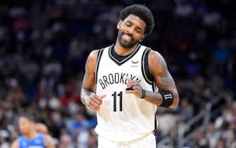 ORLANDO, FLORIDA - MARCH 15: Kyrie Irving #11 of the Brooklyn Nets reacts after scoring against the Orlando Magic in the second half at Amway Center on March 15, 2022 in Orlando, Florida. NOTE TO USER: User expressly acknowledges and agrees that, by downloading and or using this photograph, User is consenting to the terms and conditions of the Getty Images License Agreement. (Photo by Mark Brown/Getty Images)