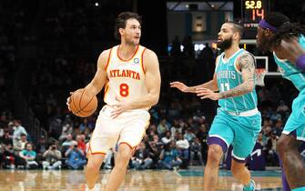 CHARLOTTE, NC - MARCH 16: Danilo Gallinari #8 of the Atlanta Hawks dribbles the ball during the game against the Charlotte Hornets on March 16, 2022 at Spectrum Center in Charlotte, North Carolina. NOTE TO USER: User expressly acknowledges and agrees that, by downloading and or using this photograph, User is consenting to the terms and conditions of the Getty Images License Agreement.  Mandatory Copyright Notice:  Copyright 2022 NBAE (Photo by Brock Williams-Smith/NBAE via Getty Images)