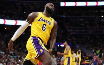 WASHINGTON, DC - MARCH 19: LeBron James #6 of the Los Angeles Lakers reacts after shooting a basket against the Washington Wizards during the first half at Capital One Arena on March 19, 2022 in Washington, DC. NOTE TO USER: User expressly acknowledges and agrees that, by downloading and or using this photograph, User is consenting to the terms and conditions of the Getty Images License Agreement. (Photo by Patrick Smith/Getty Images)