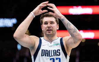 CHARLOTTE, NORTH CAROLINA - MARCH 19: Luka Doncic #77 of the Dallas Mavericks gestures to the referee in the first quarter during their game against the Charlotte Hornets at Spectrum Center on March 19, 2022 in Charlotte, North Carolina. NOTE TO USER: User expressly acknowledges and agrees that, by downloading and or using this photograph, User is consenting to the terms and conditions of the Getty Images License Agreement. (Photo by Jacob Kupferman/Getty Images)