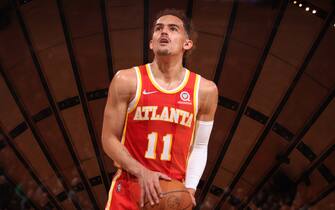 NEW YORK, NY - MARCH 22: (EDITORS NOTE: This image has been produced using a double exposure.) Trae Young #11 of the Atlanta Hawks shoots a free throw  during the game against the New York Knicks on March 22, 2022 at Madison Square Garden in New York City, New York.  NOTE TO USER: User expressly acknowledges and agrees that, by downloading and or using this photograph, User is consenting to the terms and conditions of the Getty Images License Agreement. Mandatory Copyright Notice: Copyright 2022 NBAE  (Photo by Nathaniel S. Butler/NBAE via Getty Images)