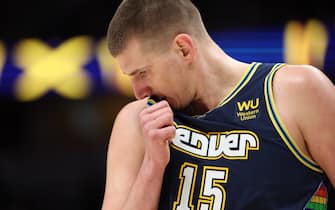 DENVER, CO - MARCH 22: Nikola Jokic #15 of the Denver Nuggets wipes his face during a game against the LA Clippers at Ball Arena on March 22, 2022 in Denver, Colorado. NOTE TO USER: User expressly acknowledges and agrees that, by downloading and or using this photograph, User is consenting to the terms and conditions of the Getty Images License Agreement (Photo by Isaiah Vazquez/Clarkson Creative/Getty Images)