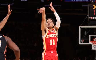 NEW YORK, NY - MARCH 22: Trae Young #11 of the Atlanta Hawks shoots a three point basket during the game against the New York Knicks on March 22, 2022 at Madison Square Garden in New York City, New York.  NOTE TO USER: User expressly acknowledges and agrees that, by downloading and or using this photograph, User is consenting to the terms and conditions of the Getty Images License Agreement. Mandatory Copyright Notice: Copyright 2022 NBAE  (Photo by Nathaniel S. Butler/NBAE via Getty Images)