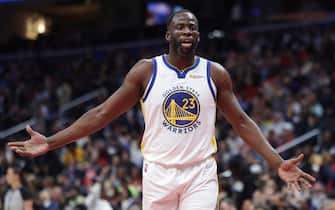 WASHINGTON, DC - MARCH 27: Draymond Green #23 of the Golden State Warriors reacts against the Washington Wizards at Capital One Arena on March 27, 2022 in Washington, DC. NOTE TO USER: User expressly acknowledges and agrees that,  by downloading and or using this photograph,  User is consenting to the terms and conditions of the Getty Images License Agreement. (Photo by Kevin Dietsch/Getty Images)