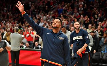 PORTLAND, OREGON - MARCH 30: CJ McCollum #3 of the New Orleans Pelicans thanks the cheering crowd before the game against the Portland Trail Blazers at the Moda Center on March 30, 2022 in Portland, Oregon. The New Orleans Pelicans won  117-107. NOTE TO USER: User expressly acknowledges and agrees that, by downloading and or using this photograph, User is consenting to the terms and conditions of the Getty Images License Agreement. (Photo by Alika Jenner/Getty Images)