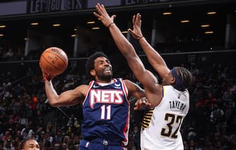 BROOKLYN, NY - APRIL 10: Kyrie Irving #11 of the Brooklyn Nets drives to the basket during the game against the Indiana Pacers on April 10, 2022 at Barclays Center in Brooklyn, New York. NOTE TO USER: User expressly acknowledges and agrees that, by downloading and or using this Photograph, user is consenting to the terms and conditions of the Getty Images License Agreement. Mandatory Copyright Notice: Copyright 2022 NBAE (Photo by Nathaniel S. Butler/NBAE via Getty Images)