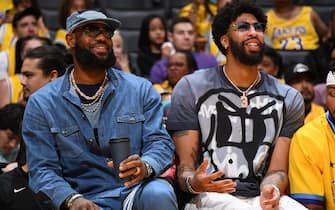 LOS ANGELES, CA - APRIL 8: LeBron James #6 of the Los Angeles Lakers and Anthony Davis #3 of the Los Angeles Lakers smile during the game against the Oklahoma City Thunder on April 8, 2022 at Crypto.Com Arena in Los Angeles, California. NOTE TO USER: User expressly acknowledges and agrees that, by downloading and/or using this Photograph, user is consenting to the terms and conditions of the Getty Images License Agreement. Mandatory Copyright Notice: Copyright 2022 NBAE (Photo by Adam Pantozzi/NBAE via Getty Images)