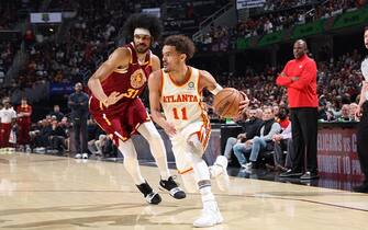 CHICAGO, IL - APRIL 15: Trae Young #11 of the Atlanta Hawks drives to the basket during the game against the Cleveland Cavaliers during the 2022 Play-In Tournament on April 15, 2022 at Rocket Mortgage Fieldhouse in Cleveland, Ohio. NOTE TO USER: User expressly acknowledges and agrees that, by downloading and or using this photograph, User is consenting to the terms and conditions of the Getty Images License Agreement. Mandatory Copyright Notice: Copyright 2022 NBAE (Photo by Jeff Haynes/NBAE via Getty Images)