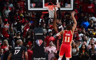 ATLANTA, GA - APRIL 22: Trae Young #11 of the Atlanta Hawks shoots the ball to win the game against the Miami Heat during Round 1 Game 3 of the NBA Playoffs on April 22, 2022 at State Farm Arena in Atlanta, Georgia.  NOTE TO USER: User expressly acknowledges and agrees that, by downloading and/or using this Photograph, user is consenting to the terms and conditions of the Getty Images License Agreement. Mandatory Copyright Notice: Copyright 2022 NBAE (Photo by Scott Cunningham/NBAE via Getty Images)             
