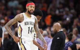 PHOENIX, ARIZONA - APRIL 26: Brandon Ingram #14 of the New Orleans Pelicans reacts as he walks to the bench during the second half of Game Five of the Western Conference First Round NBA Playoffs against the Phoenix Suns at Footprint Center on April 26, 2022 in Phoenix, Arizona.  The Suns defeated the Pelicans 112-97. NOTE TO USER: User expressly acknowledges and agrees that, by downloading and or using this photograph, User is consenting to the terms and conditions of the Getty Images License Agreement. (Photo by Christian Petersen/Getty Images)