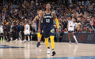 MEMPHIS, TN - APRIL 26: Ja Morant #12 of the Memphis Grizzlies celebrates after the game against the Minnesota Timberwolves during Round 1 Game 5 of the 2022 NBA Playoffs on April 26, 2022 at FedExForum in Memphis, Tennessee. NOTE TO USER: User expressly acknowledges and agrees that, by downloading and or using this photograph, User is consenting to the terms and conditions of the Getty Images License Agreement. Mandatory Copyright Notice: Copyright 2022 NBAE (Photo by Joe Murphy/NBAE via Getty Images)