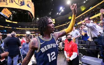 MEMPHIS, TN - APRIL 26: Ja Morant #12 of the Memphis Grizzlies walks off the court after the game against the Minnesota Timberwolves during Round 1 Game 5 of the 2022 NBA Playoffs on April 26, 2022 at FedExForum in Memphis, Tennessee. NOTE TO USER: User expressly acknowledges and agrees that, by downloading and or using this photograph, User is consenting to the terms and conditions of the Getty Images License Agreement. Mandatory Copyright Notice: Copyright 2022 NBAE (Photo by Joe Murphy/NBAE via Getty Images)
