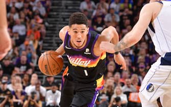 PHOENIX, AZ - MAY 4: Devin Booker #1 of the Phoenix Suns drives to the basket during Game 2 of the 2022 NBA Playoffs Western Conference Semifinals against the Dallas Mavericks on May 4, 2022 at Footprint Center in Phoenix, Arizona. NOTE TO USER: User expressly acknowledges and agrees that, by downloading and or using this photograph, user is consenting to the terms and conditions of the Getty Images License Agreement. Mandatory Copyright Notice: Copyright 2022 NBAE (Photo by Michael Gonzales/NBAE via Getty Images)