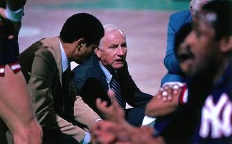 BOSTON, MA - 1982: Red Holzman Head Coach of the New York Knicks discusses strategy during a game against the Boston Celtics during a game circa 1982 at the Boston Garden in Boston, Massachusetts. NOTE TO USER: User expressly acknowledges and agrees that, by downloading and or using this photograph, User is consenting to the terms and conditions of the Getty Images License Agreement. Mandatory Copyright Notice: Copyright 1982 NBAE (Photo by Dick Raphael/NBAE via Getty Images)