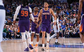 DALLAS, TX - MAY 6: Devin Booker #1 of the Phoenix Suns high fives Jae Crowder #99 of the Phoenix Suns during Game 3 of the 2022 NBA Playoffs Western Conference Semifinals on May 6, 2022 at the American Airlines Center in Dallas, Texas. NOTE TO USER: User expressly acknowledges and agrees that, by downloading and or using this photograph, User is consenting to the terms and conditions of the Getty Images License Agreement. Mandatory Copyright Notice: Copyright 2022 NBAE (Photo by Garrett Ellwood/NBAE via Getty Images)