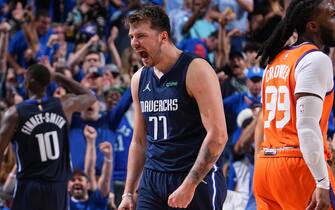DALLAS, TX - MAY 8: Luka Doncic #77 of the Dallas Mavericks celebrates against the Phoenix Suns during Game 4 of the 2022 NBA Playoffs Western Conference Semifinals on May 8, 2022 at the American Airlines Center in Dallas, Texas. NOTE TO USER: User expressly acknowledges and agrees that, by downloading and or using this photograph, User is consenting to the terms and conditions of the Getty Images License Agreement. Mandatory Copyright Notice: Copyright 2022 NBAE (Photo by Garrett Ellwood/NBAE via Getty Images)