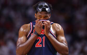 MIAMI, FLORIDA - MAY 10: Joel Embiid #21 of the Philadelphia 76ers reacts against the Miami Heat during the first half in Game Five of the Eastern Conference Semifinals at FTX Arena on May 10, 2022 in Miami, Florida. NOTE TO USER: User expressly acknowledges and agrees that, by downloading and or using this photograph, User is consenting to the terms and conditions of the Getty Images License Agreement.  (Photo by Michael Reaves/Getty Images)