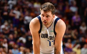 PHOENIX, AZ - MAY 10: Luka Doncic #77 of the Dallas Mavericks looks on against the Phoenix Suns during Game 5 of the 2022 NBA Playoffs Western Conference Semifinals on May 10, 2022 at Footprint Center in Phoenix, Arizona. NOTE TO USER: User expressly acknowledges and agrees that, by downloading and or using this photograph, user is consenting to the terms and conditions of the Getty Images License Agreement. Mandatory Copyright Notice: Copyright 2022 NBAE (Photo by Barry Gossage/NBAE via Getty Images)