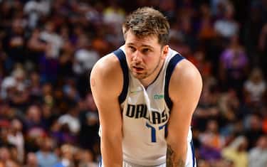 PHOENIX, AZ - MAY 10: Luka Doncic #77 of the Dallas Mavericks looks on against the Phoenix Suns during Game 5 of the 2022 NBA Playoffs Western Conference Semifinals on May 10, 2022 at Footprint Center in Phoenix, Arizona. NOTE TO USER: User expressly acknowledges and agrees that, by downloading and or using this photograph, user is consenting to the terms and conditions of the Getty Images License Agreement. Mandatory Copyright Notice: Copyright 2022 NBAE (Photo by Barry Gossage/NBAE via Getty Images)