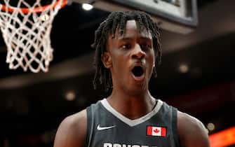 PORTLAND, OREGON - APRIL 08: Leonard Miller #9 of World Team reacts during the third quarter against USA Team during the Nike Hoop Summit at Moda Center on April 08, 2022 in Portland, Oregon. (Photo by Steph Chambers/Getty Images)