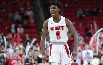 RALEIGH, NC - FEBRUARY 09: North Carolina State Wolfpack guard Terquavion Smith (0) celebrates a three-pointer during the college basketball game between NC State and Wake Forest on February 9, 2022, at PNC Arena in Raleigh, NC. (Photo by Nicholas Faulkner/Icon Sportswire)