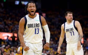 SAN FRANCISCO, CALIFORNIA - MAY 18: Jalen Brunson #13 of the Dallas Mavericks celebrates a basket against the Golden State Warriors during the second quarter in Game One of the 2022 NBA Playoffs Western Conference Finals at Chase Center on May 18, 2022 in San Francisco, California. NOTE TO USER: User expressly acknowledges and agrees that, by downloading and or using this photograph, User is consenting to the terms and conditions of the Getty Images License Agreement.  (Photo by Harry How/Getty Images)