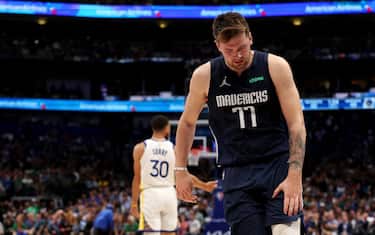 DALLAS, TEXAS - MAY 22: Luka Doncic #77 of the Dallas Mavericks reacts after a play during the second quarter against the Golden State Warriors in Game Three of the 2022 NBA Playoffs Western Conference Finals at American Airlines Center on May 22, 2022 in Dallas, Texas. NOTE TO USER: User expressly acknowledges and agrees that, by downloading and or using this photograph, User is consenting to the terms and conditions of the Getty Images License Agreement. (Photo by Tom Pennington/Getty Images)