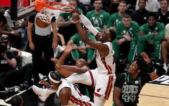 MIAMI, FLORIDA - MAY 25: Bam Adebayo #13 of the Miami Heat dunks the ball against Al Horford #42 of the Boston Celtics during the first quarter in Game Five of the 2022 NBA Playoffs Eastern Conference Finals at FTX Arena on May 25, 2022 in Miami, Florida. NOTE TO USER: User expressly acknowledges and agrees that, by downloading and or using this photograph, User is consenting to the terms and conditions of the Getty Images License Agreement. (Photo by Eric Espada/Getty Images)