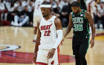 MIAMI, FLORIDA - MAY 25: Jimmy Butler #22 of the Miami Heat looks on ahead of Marcus Smart #36 of the Boston Celtics during the first quarter in Game Five of the 2022 NBA Playoffs Eastern Conference Finals at FTX Arena on May 25, 2022 in Miami, Florida. NOTE TO USER: User expressly acknowledges and agrees that, by downloading and or using this photograph, User is consenting to the terms and conditions of the Getty Images License Agreement. (Photo by Andy Lyons/Getty Images)