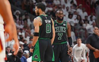 MIAMI, FL - MAY 25: Jayson Tatum #0 of the Boston Celtics and Jaylen Brown #7 of the Boston Celtics high-five during Game 5 of the 2022 NBA Playoffs Eastern Conference Finals on May 25, 2022 at The FTX Arena in Miami, Florida. NOTE TO USER: User expressly acknowledges and agrees that, by downloading and/or using this Photograph, user is consenting to the terms and conditions of the Getty Images License Agreement. Mandatory Copyright Notice: Copyright 2022 NBAE (Photo by Jesse D. Garrabrant/NBAE via Getty Images) 