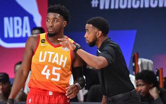 Orlando, FL - AUGUST 3: Johnnie Bryant coaches Donovan Mitchell #45 of the Utah Jazz during a game against the Los Angeles Lakers on August 3, 2020 at The Arena at ESPN Wide World Of Sports Complex in Orlando, Florida. NOTE TO USER: User expressly acknowledges and agrees that, by downloading and/or using this Photograph, user is consenting to the terms and conditions of the Getty Images License Agreement. Mandatory Copyright Notice: Copyright 2020 NBAE (Photo by David Dow/NBAE via Getty Images)